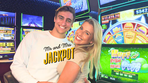 Mr and Mrs Jackpot at the slot machines